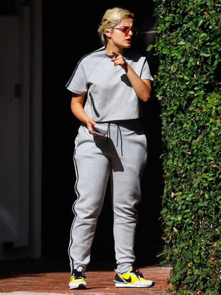 Bebe Rexha Heads to the Airport in Trendy Matching Sweats and Chic Sneaks