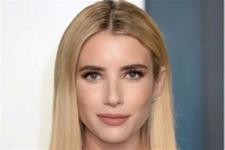 Emma Roberts Puts Her Growing Baby Bump On Full Display In Stine Goya Midi Dress